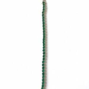 Emerald colored stone tennis bracelet